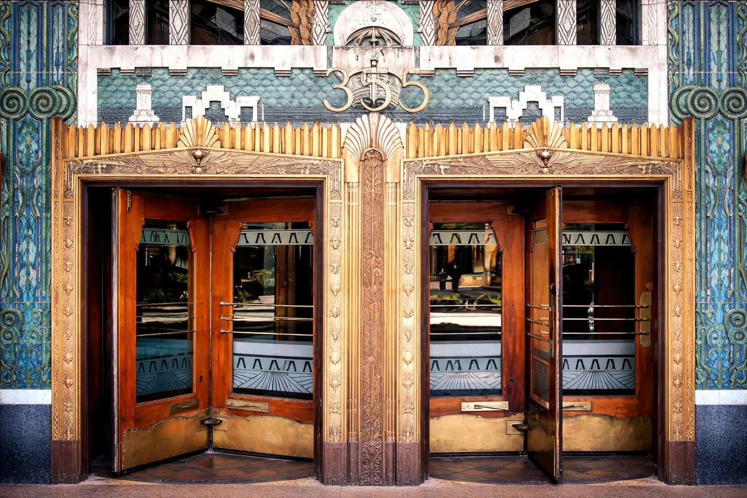 Rich colors on the doors of an Art Deco building