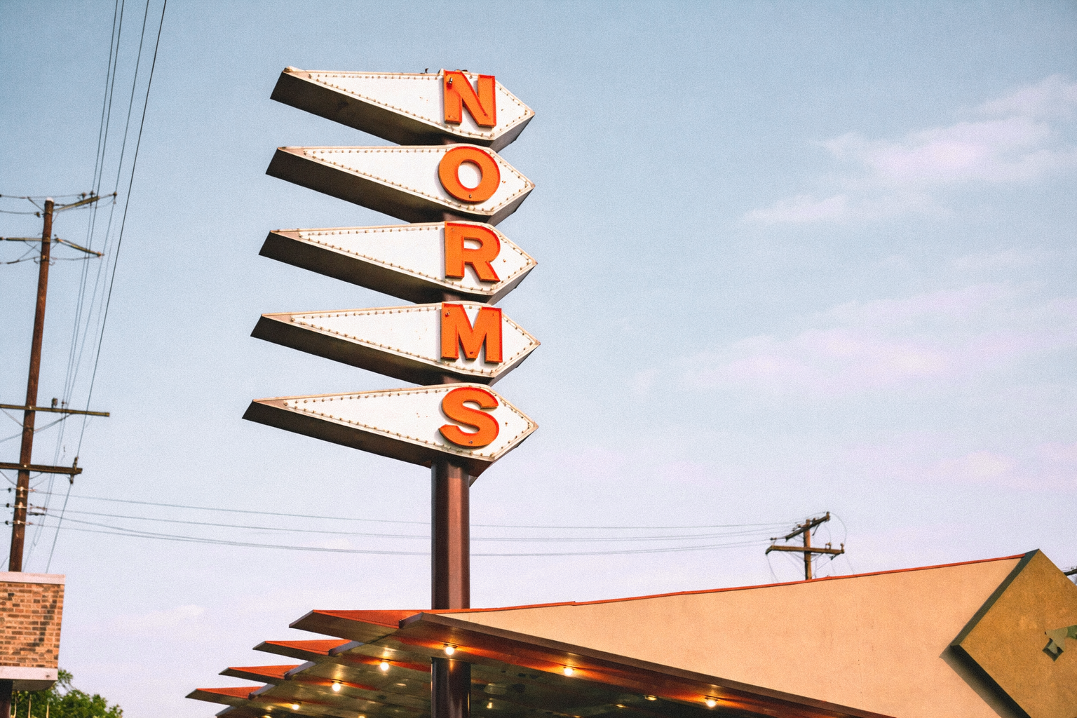 A Googie sign on top of a building