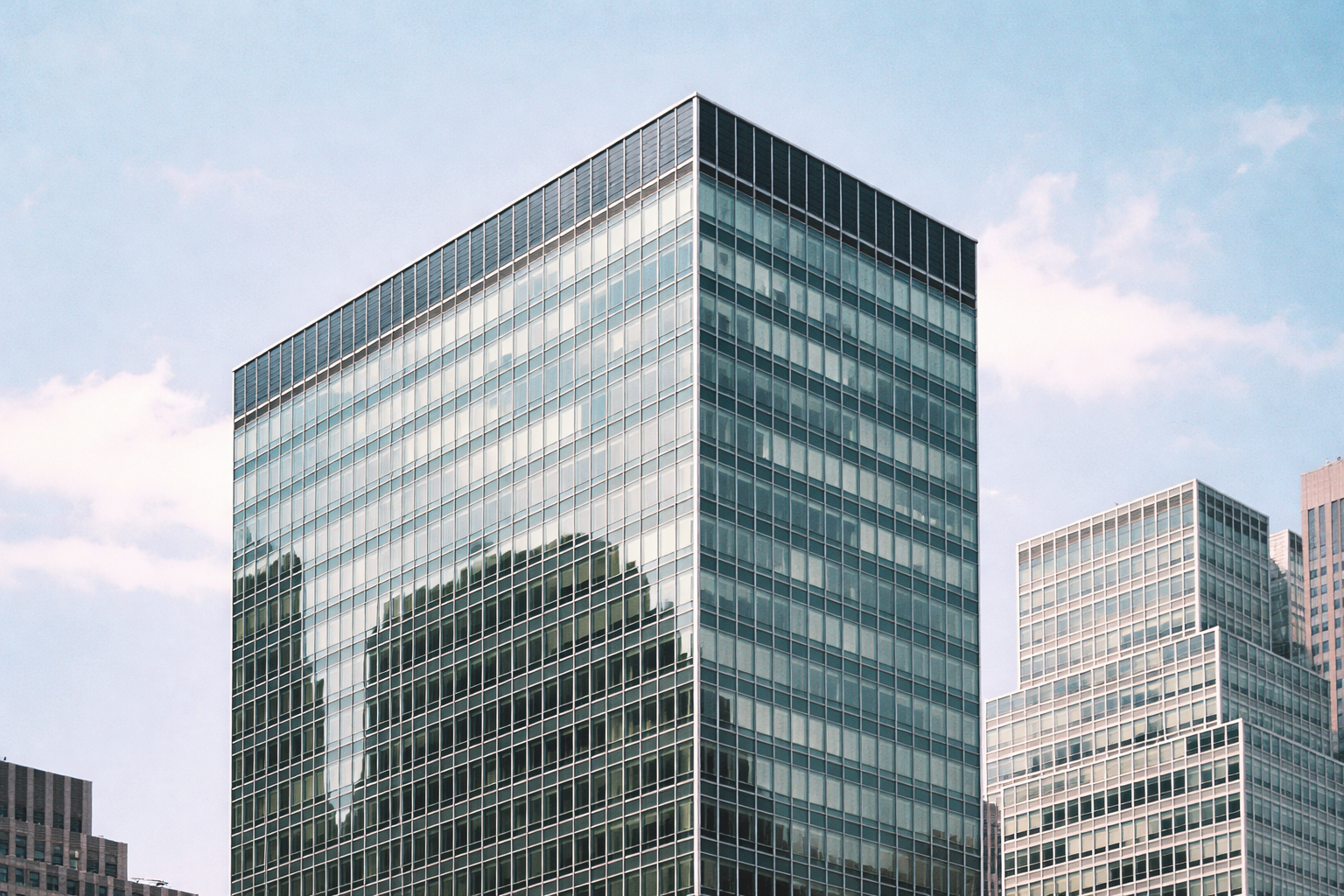 Uniformity, but not symmetry The upper stories of an International Style skyscraper