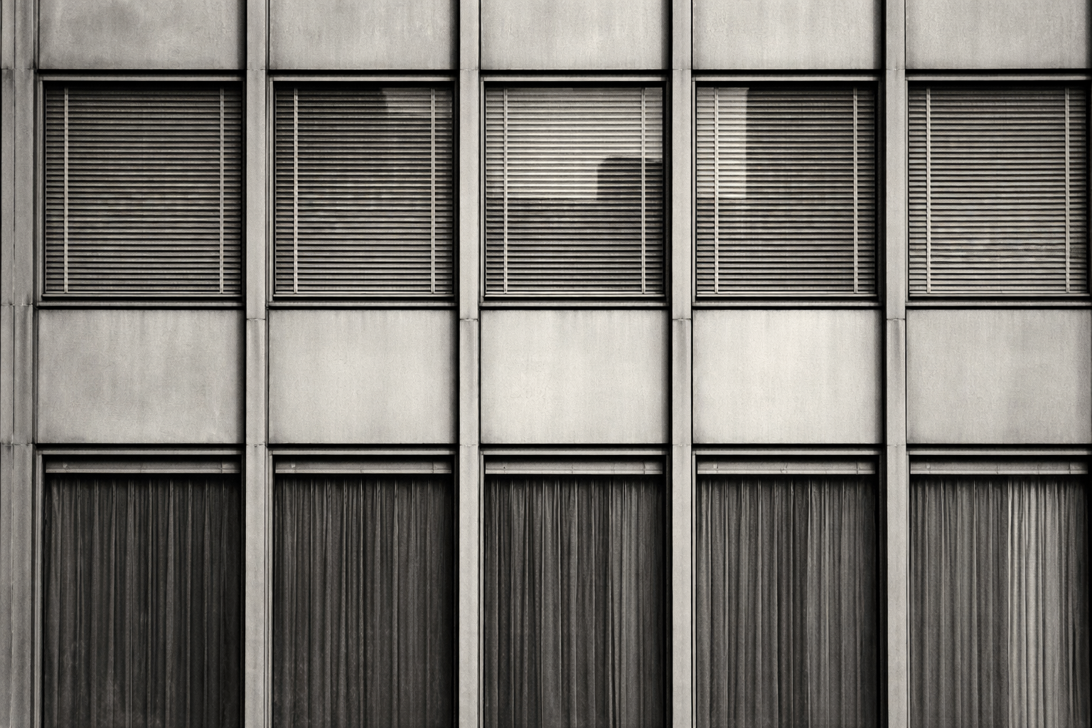 International Style 6 A close up of the thick spandrel panels of an International Style skyscraper