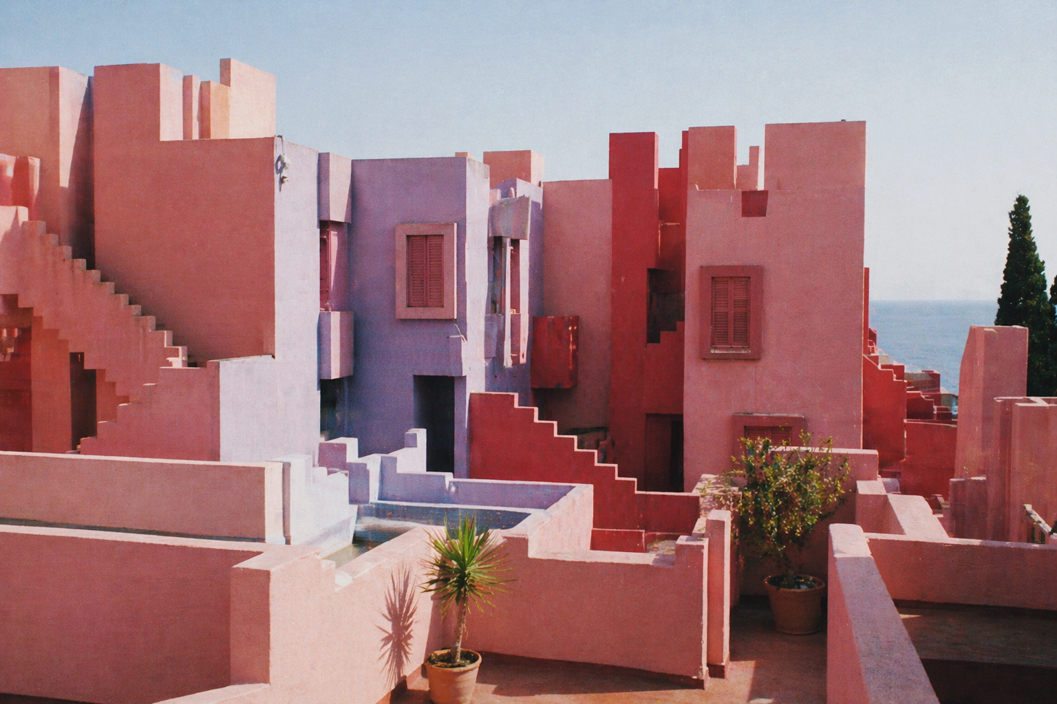 Jagged, non-symmetrical shapes on the postmodern La Muralla Roja buildings in Spain