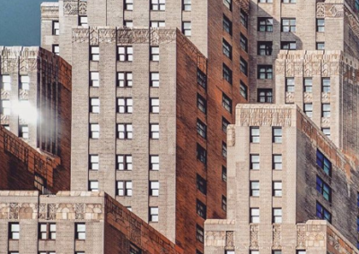 Close up of the rectangular storeys of an Art Deco building