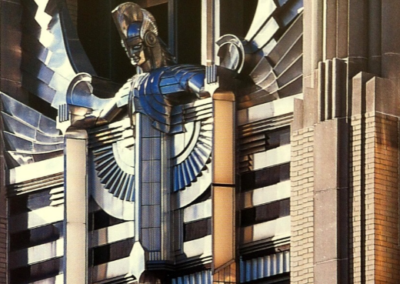 Zoomed in view of a statue on an Art Deco building