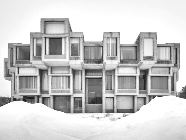 Cubic units on a Brutalist building in the snow