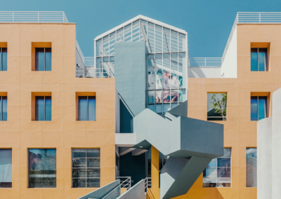 Blue and orange asymmetric postmodern building staircase