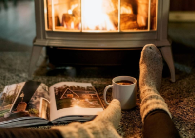 Lounging near a fireplace