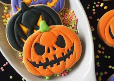 Close up of Jack-o'-lantern cookies on a plate