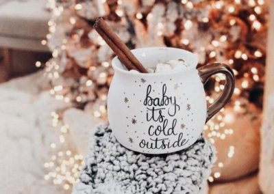 Mug with "Baby It's Cold Outside" written on it